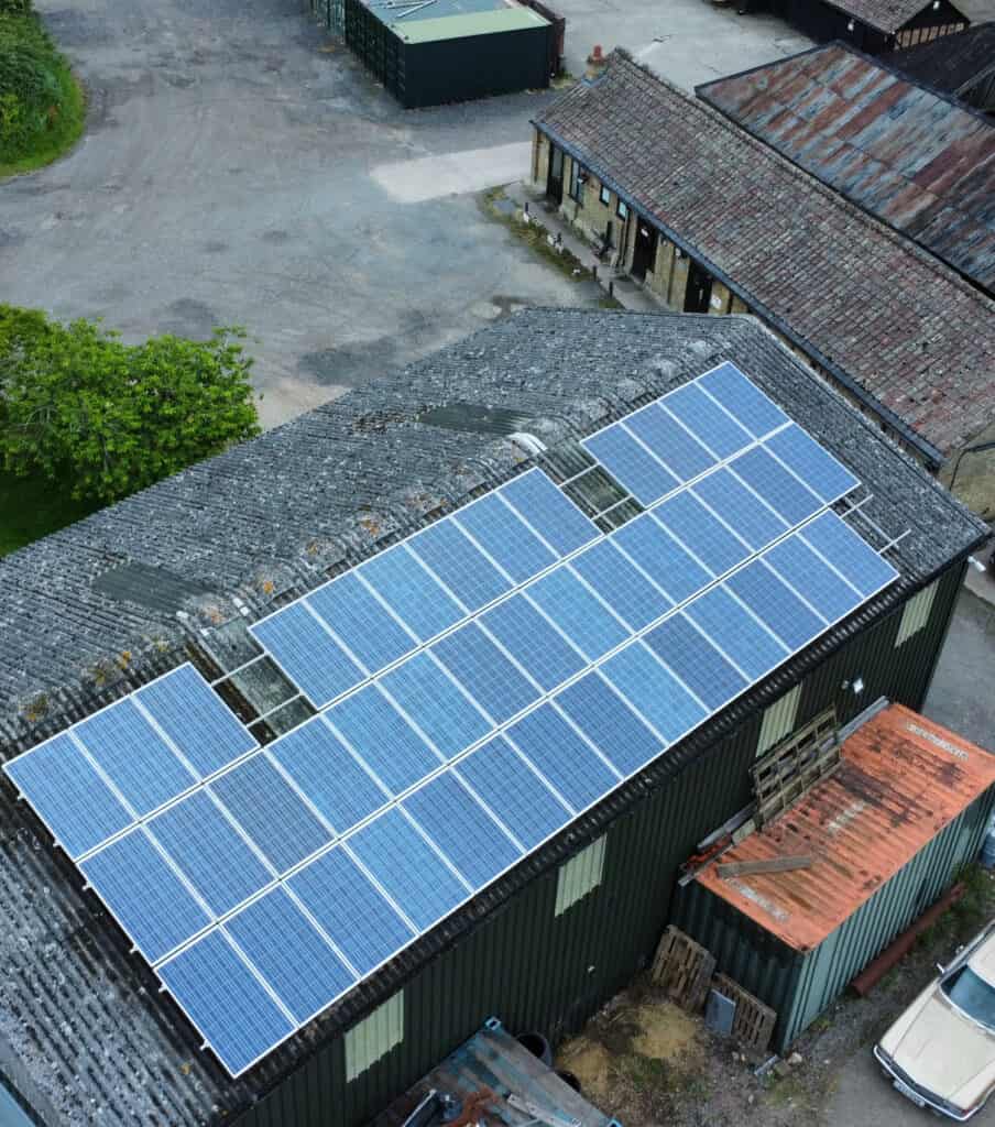 Blue solar panels on the roof of barn on a Cambridgeshire farm, cleaned by EV Solar UK