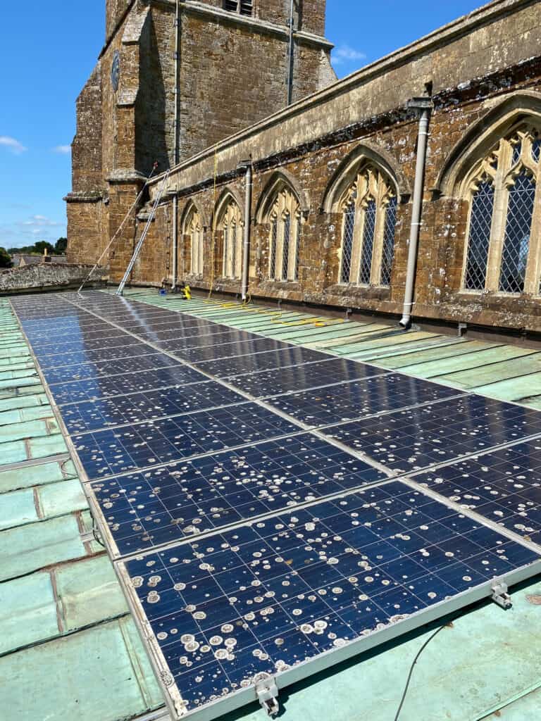 Oxfordshire solar panels covered in lichen and moss that need professional cleaning by EV Solar