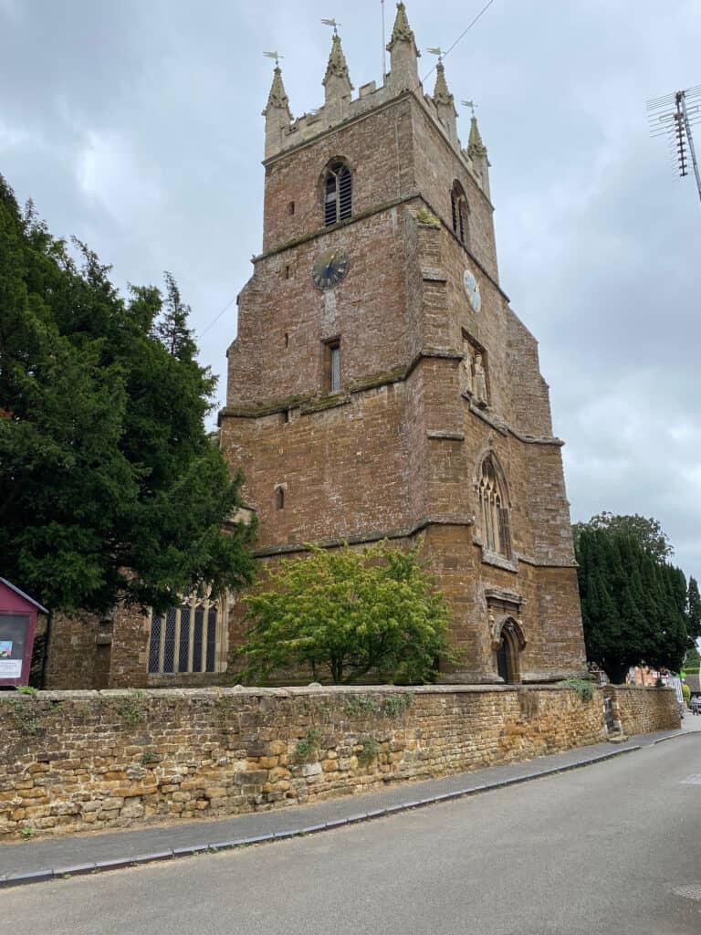 A photo of the bell tower of St. Peter's & St. Paul's Church in Deddington, Oxfordshire taken from Church Street